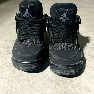 Nike black cat size 4y